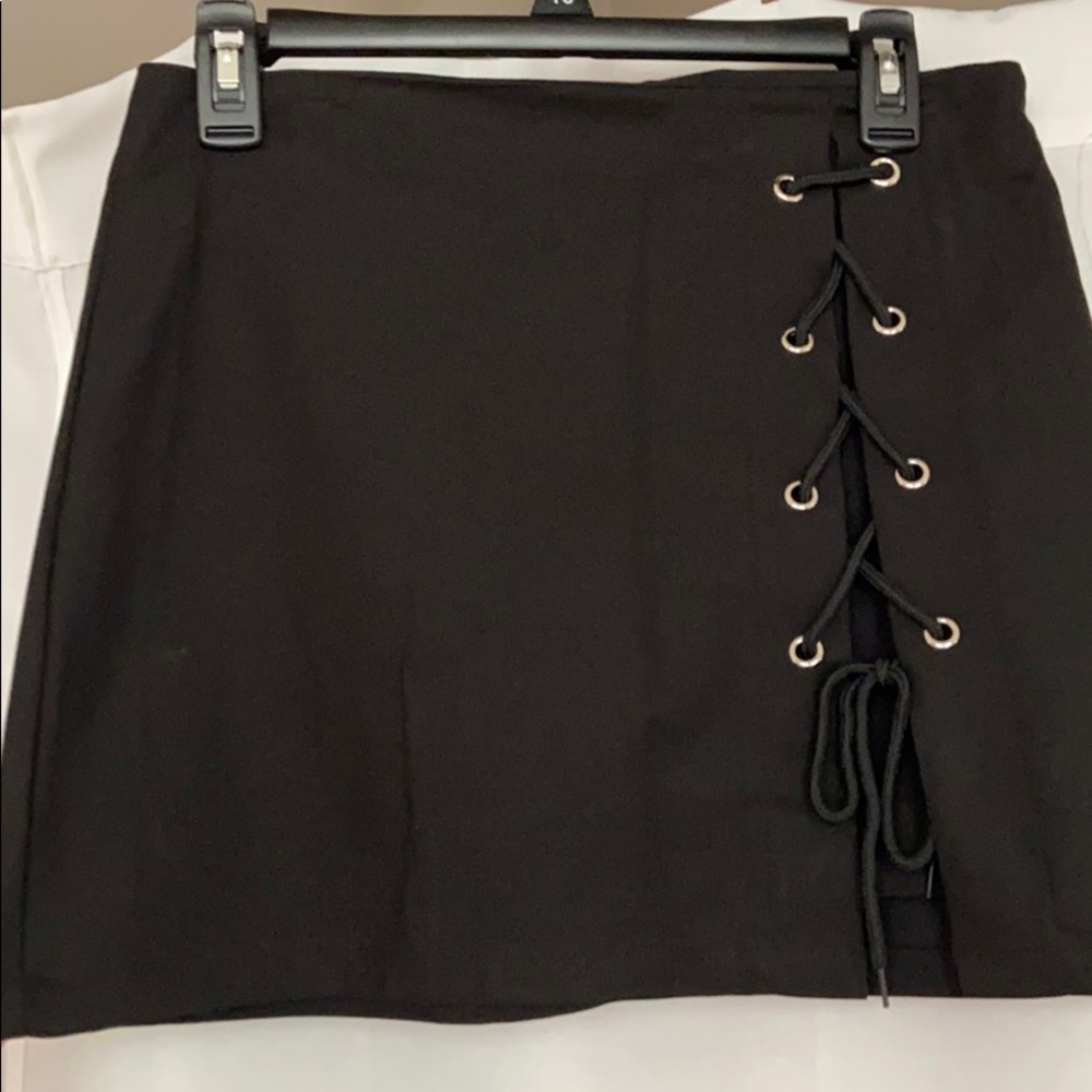 Black skirt with lace up detailing